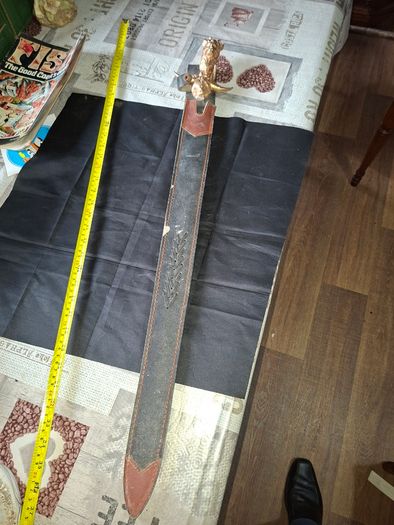 Antique Sword with Hilt, The hilt features a demonic face at the pommel, often representing a wrathful deity like Mahakala or Hayagriva Postage Available