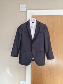 Dark grey boys suit and white shirt 1880 club