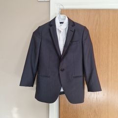 Dark grey boys suit and white shirt 1880 club