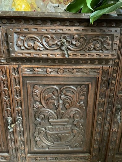 Ornate carved wooden dresser