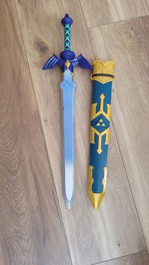 Legend of Zelda toy sword and cover