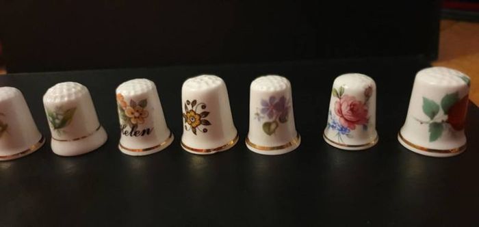 Collection of Flower Themed Gold Coloured Edged Thimbles