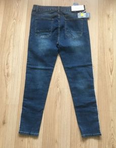 Melbourne designer denim cotton jeans 34 waist elasticated and 27 inch leg new with tags FREE STANDARD POSTAGE INCLUDED