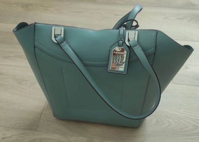 Large Ralph Lauren tote in soft blue. Silver metal hardware and catch fastener.