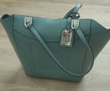 Large Ralph Lauren tote in soft blue. Silver metal hardware and catch fastener.