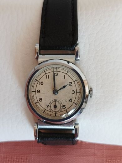 very old manual Foreign watch. Leather strap. Working. Beautiful 15 Jewels manual wind movement Swiss made .