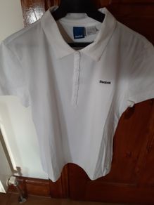 2 Ladies Sports Tops from Reebok tags attached Size 12/14