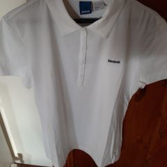 2 Ladies Sports Tops from Reebok tags attached Size 12/14