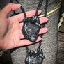 Anatomical heart made from black polymer clay with silver details on black rope Image 3
