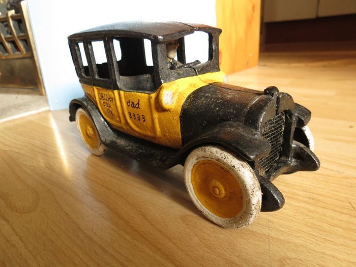 Vintage (from 1920) Cast Iron Yellow Taxi Car