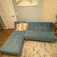 Blue plush sofa bed