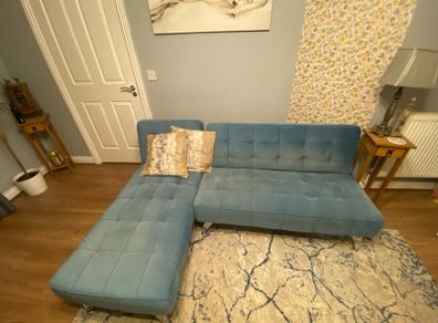 Blue plush sofa bed