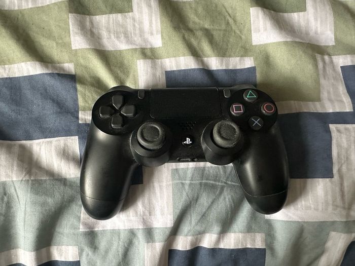 PlayStation 4 Pro 1TB SSD with games, cables and controller