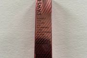 Lawless lip plumping gloss in cherry vanilla