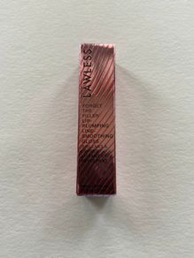 Lawless lip plumping gloss in cherry vanilla