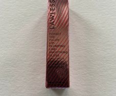 Lawless lip plumping gloss in cherry vanilla