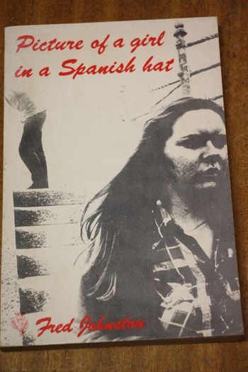 Picture of a girl in a Spanish hat.