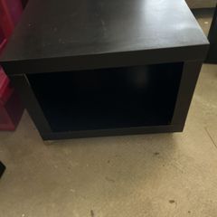 Side or coffee table with storage