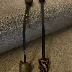Antique wooden and sprung-steel shoe shapers