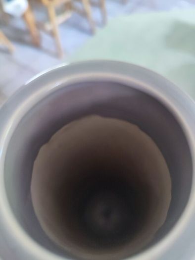 Lovely tall vase  handcrafted slight variations occur giving each product its own uniqueness.