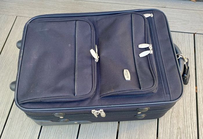 Compact wheelie travel suitcase