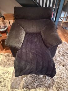Black reclining lounger armchair