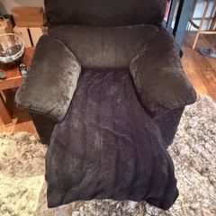 Black reclining lounger armchair