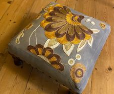 Decorative Grey upholstered footstool mustard embroidery wooden legs