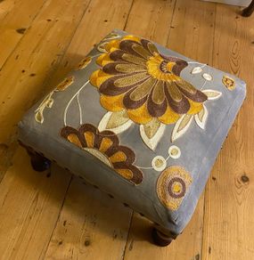 Decorative Grey upholstered footstool mustard embroidery wooden legs