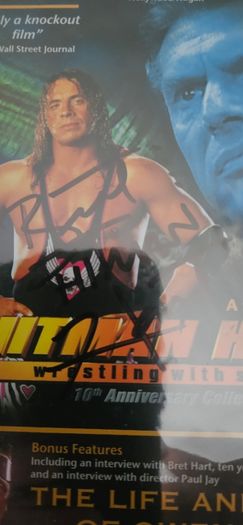 WWE wrestling Signed dvd