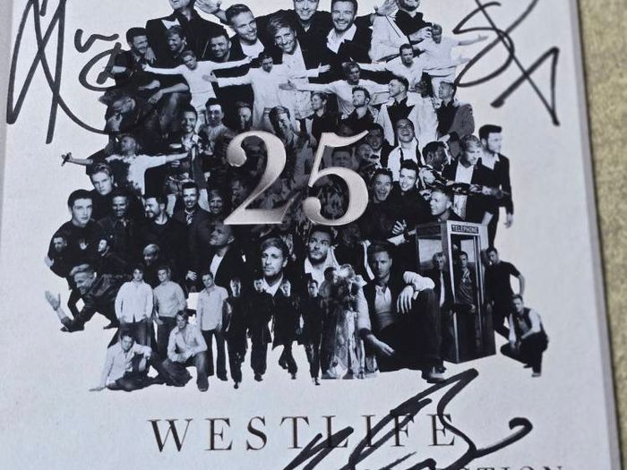 CD signed insert by west life celebrating 25 years together