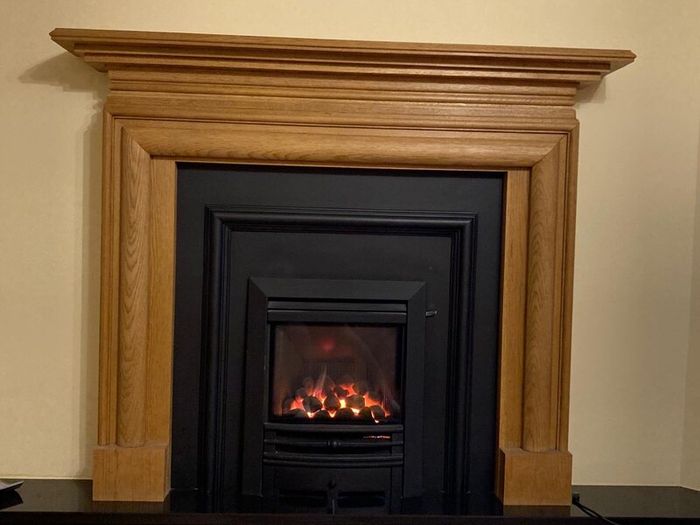 Gas Fire and solid wood surround
