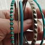 Charming bracelets in silver and blue tones. Image 3