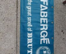 Vintage advertising Brut 33 ,Double sided  washable  plastic banner,,came from closed down chemist shop ,hard to come by ,,sold as seen,,buyer collects or pays postage thank you.