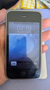 Locked iPhone missing top button crack to case