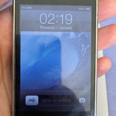 Locked iPhone missing top button crack to case