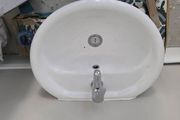 toilet wash basin with tap cover