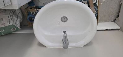 toilet wash basin with tap cover