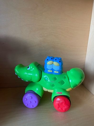 Fisher Price Crocodile Toy, great for toddlers. Press down and go