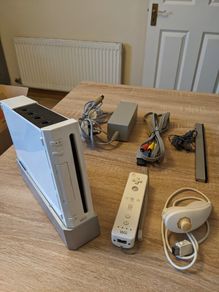 Wii Console with remote & nunchuck