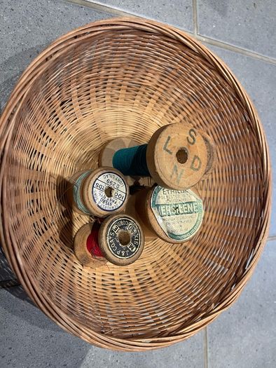 Vintage spools of thread and basket