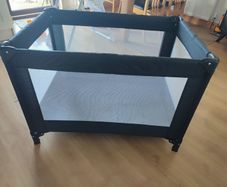 Black travel cot
