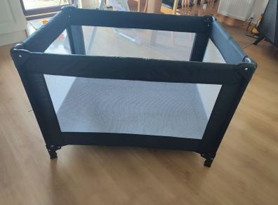 Black travel cot