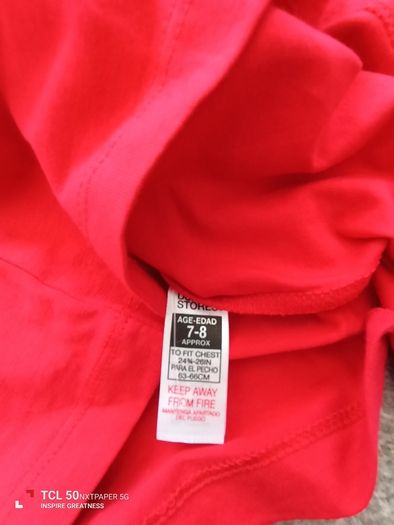 NEW.boy's red top.age 7/8
