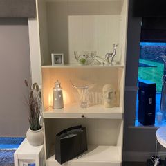 Tall bookcase with drawers