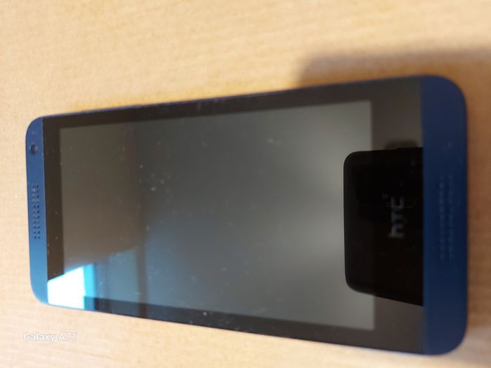 HTC Desire 610, Model 0P9O200, for parts or repair, not powering on