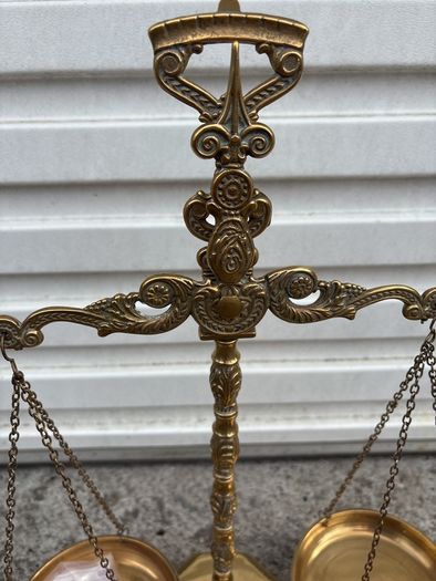 Ornate brass scales