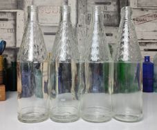 302 - Set of 4 Vintage Floral Decorative Collectible Clear Glass Tall Big Bottles