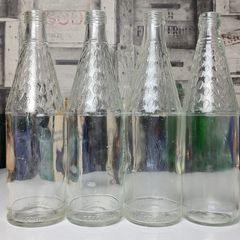302 - Set of 4 Vintage Floral Decorative Collectible Clear Glass Tall Big Bottles