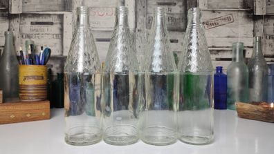 302 - Set of 4 Vintage Floral Decorative Collectible Clear Glass Tall Big Bottles